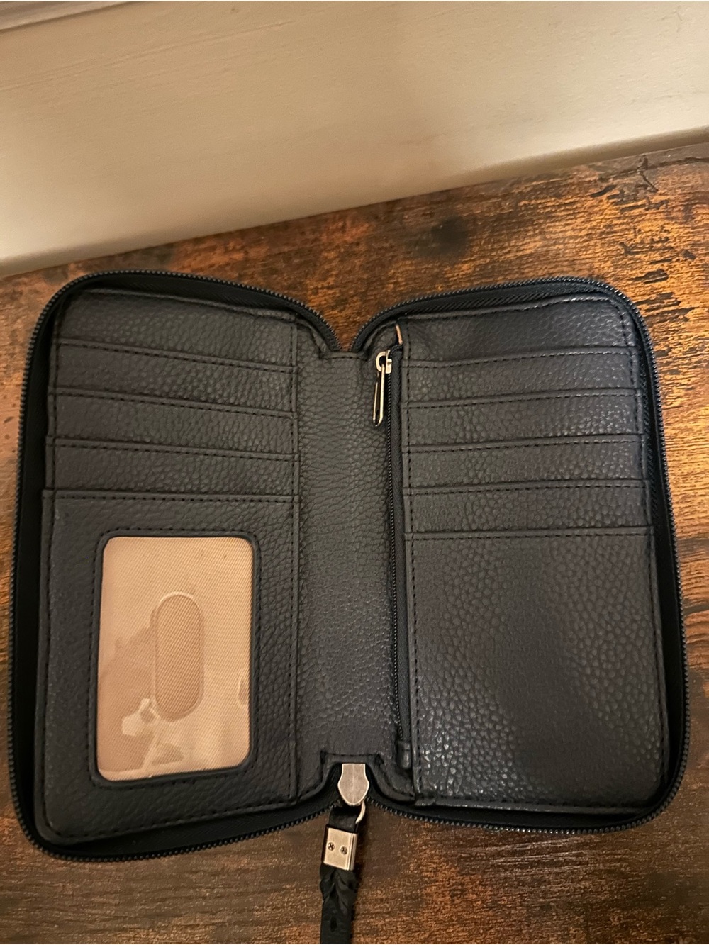 The Sak Navy Zip-Around Leather Wallet with Wrist Strap